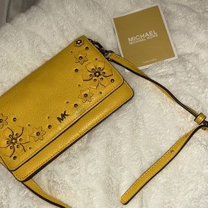 Yellow Michael Kors pouch wallet